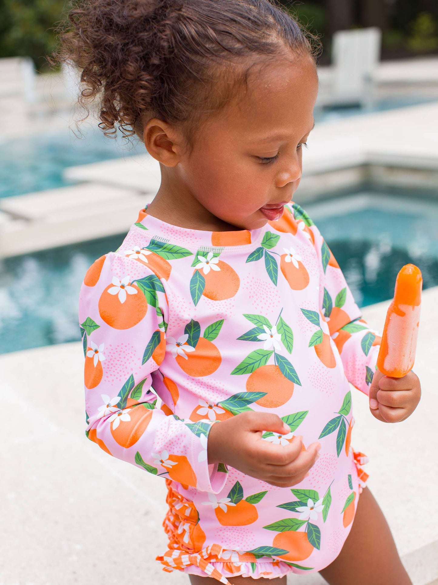 Baby Girls Orange You The Sweetest Long Sleeve One Piece Rash Guard Swimsuit with Signature Rear Ruffles