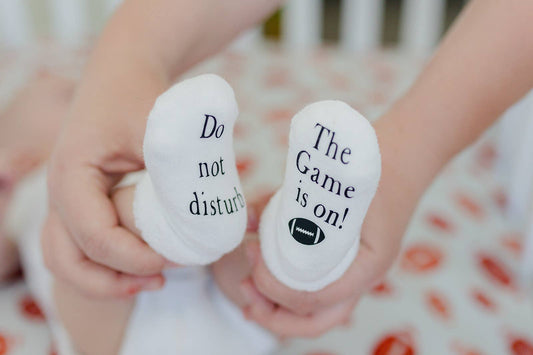 Do Not Disturb The Game is on Football Baby Socks | Sports