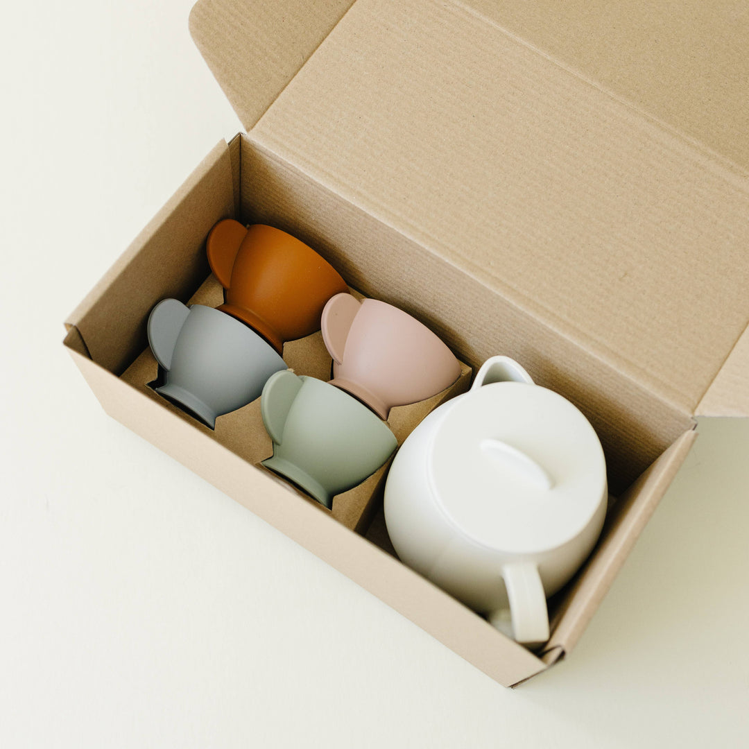 Juego de té de silicona con mezcla de colores crema