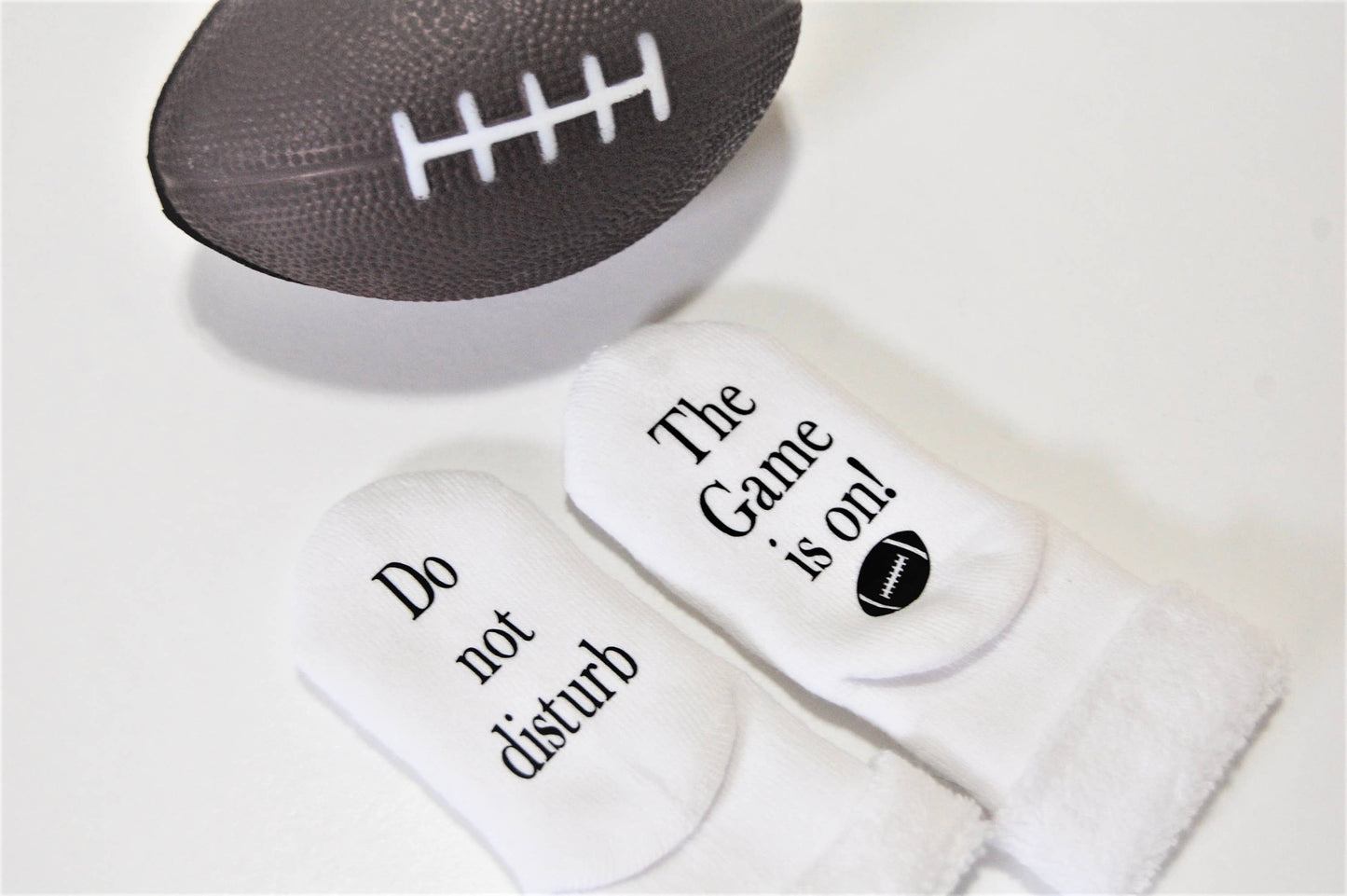 Do Not Disturb The Game is on Football Baby Socks | Sports