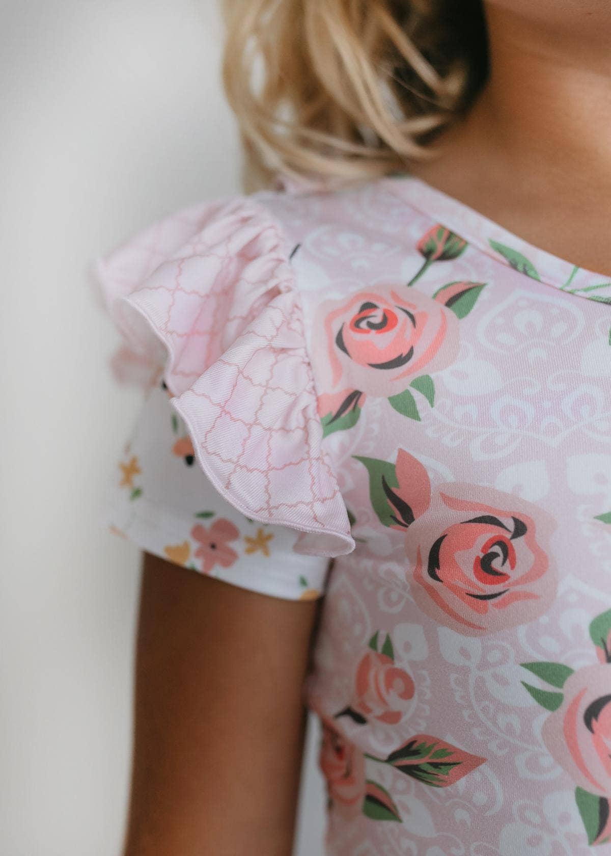 Maillot de gimnasia con falda y volantes para niños en color rosa pálido