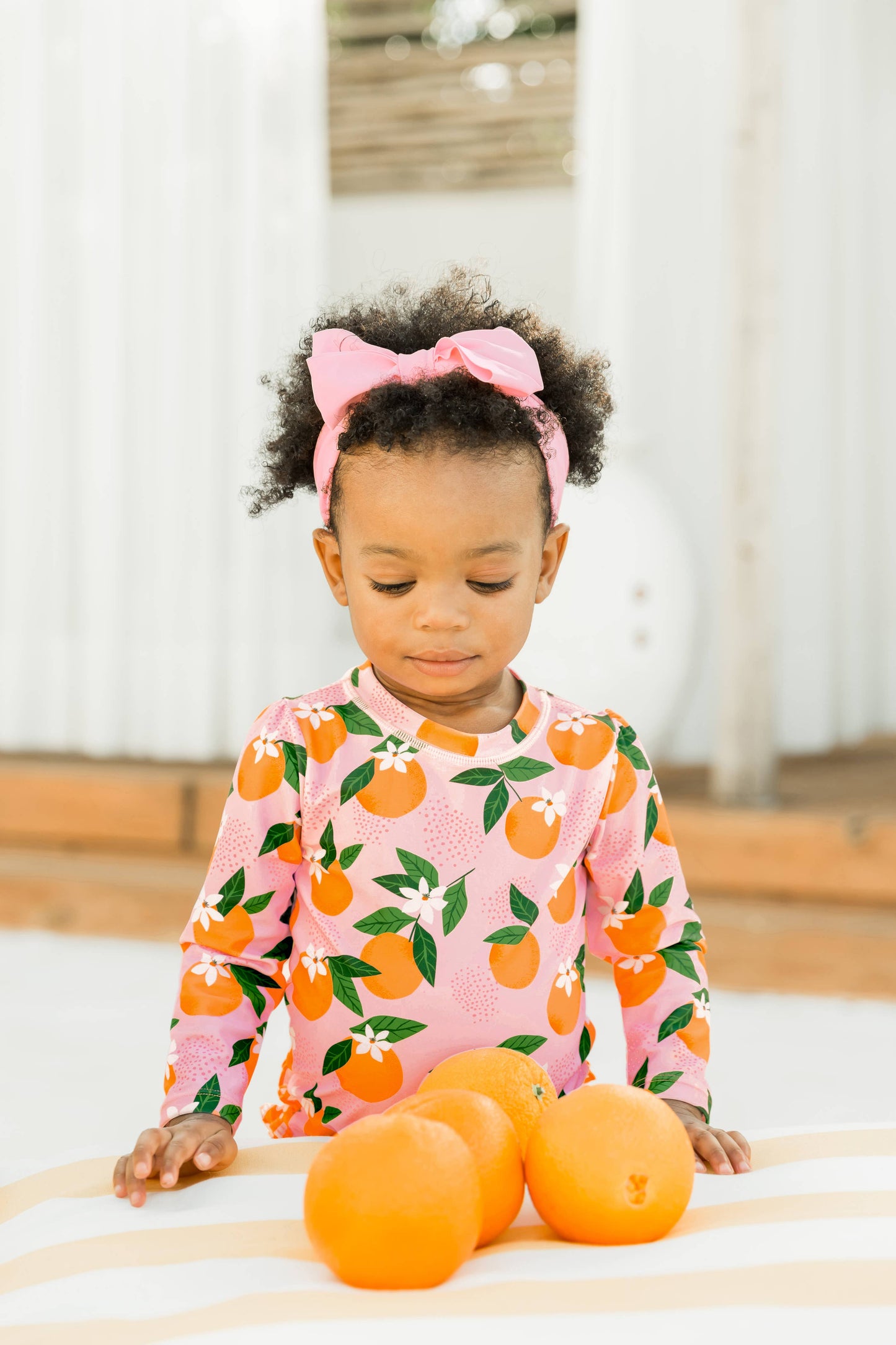 Baby Girls Orange You The Sweetest Long Sleeve One Piece Rash Guard Swimsuit with Signature Rear Ruffles